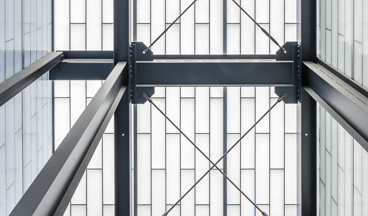 Interior photo of Middle West Spirits featuring distillery equipment.