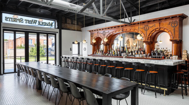 Interior photo of Middle West Spirits featuring the antique bar.