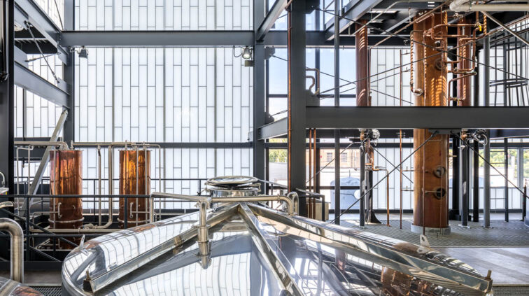 Interior photo of Middle West Spirits featuring distillery equipment.