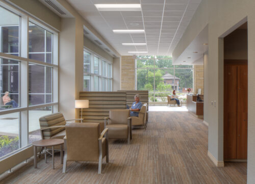 Interior photo of Fairfield Medical Center Surgery Addition featuring a waiting area with table and chairs.