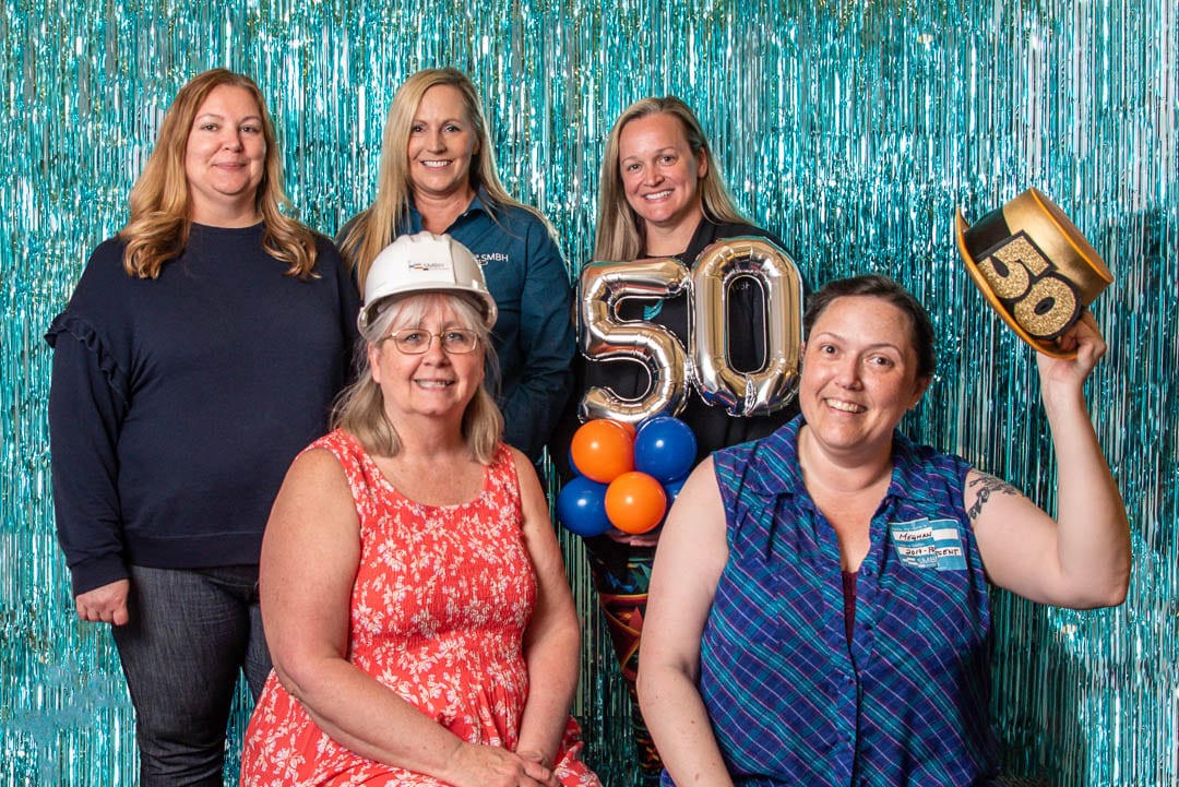A group photo of the Administration + Business Administration team including Melanie Hise, Dawn Groves, Lisa Connelly, Sheri Robey, and Meghan Ralston