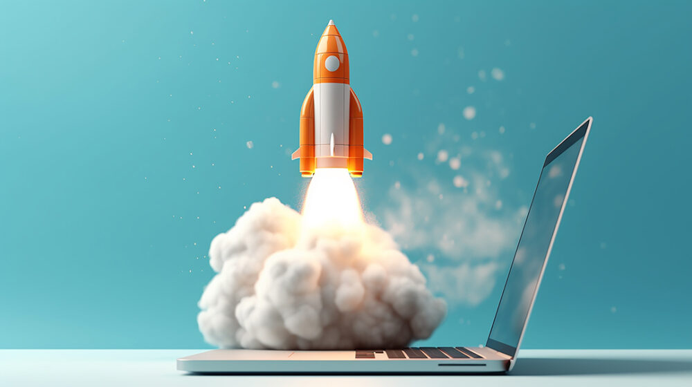 An AI image of an orange and white sleek looking rocket launching from the keyboard of an open silver laptop. Take on a team background and a white table.